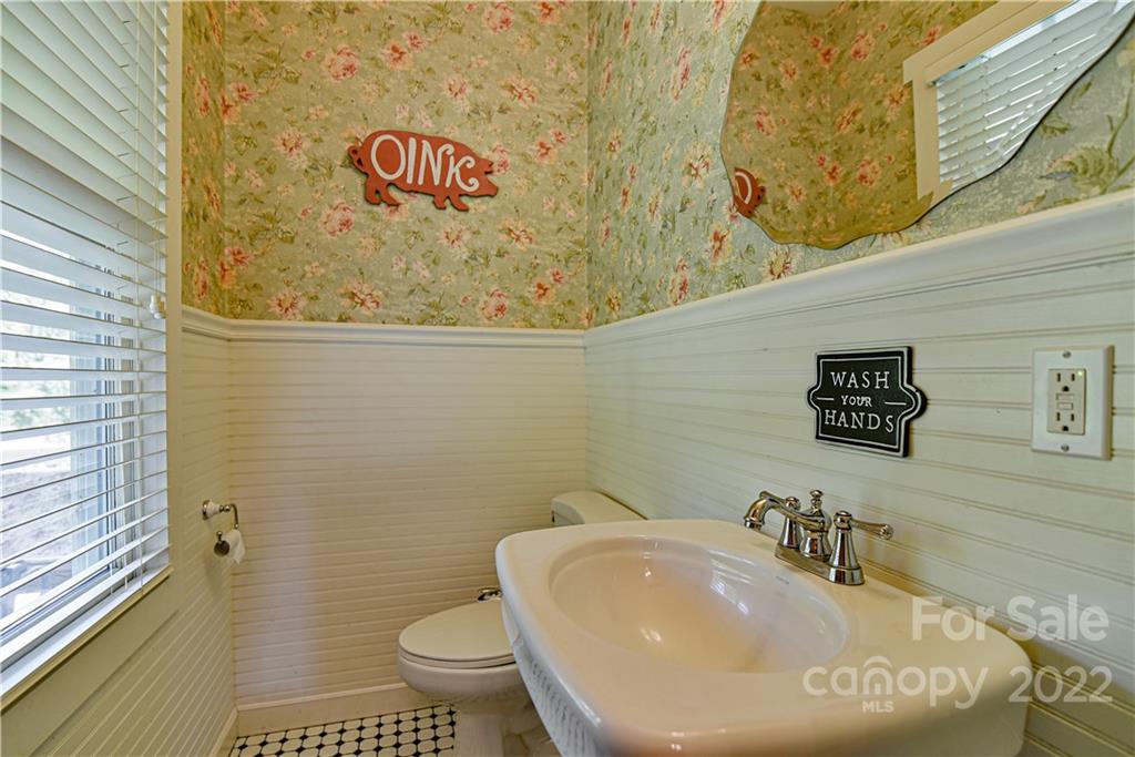 157 Poverty Branch Road Barnardsville, NC 28709 - Photo 18 of 48 a bathroom with a sink and a toilet
