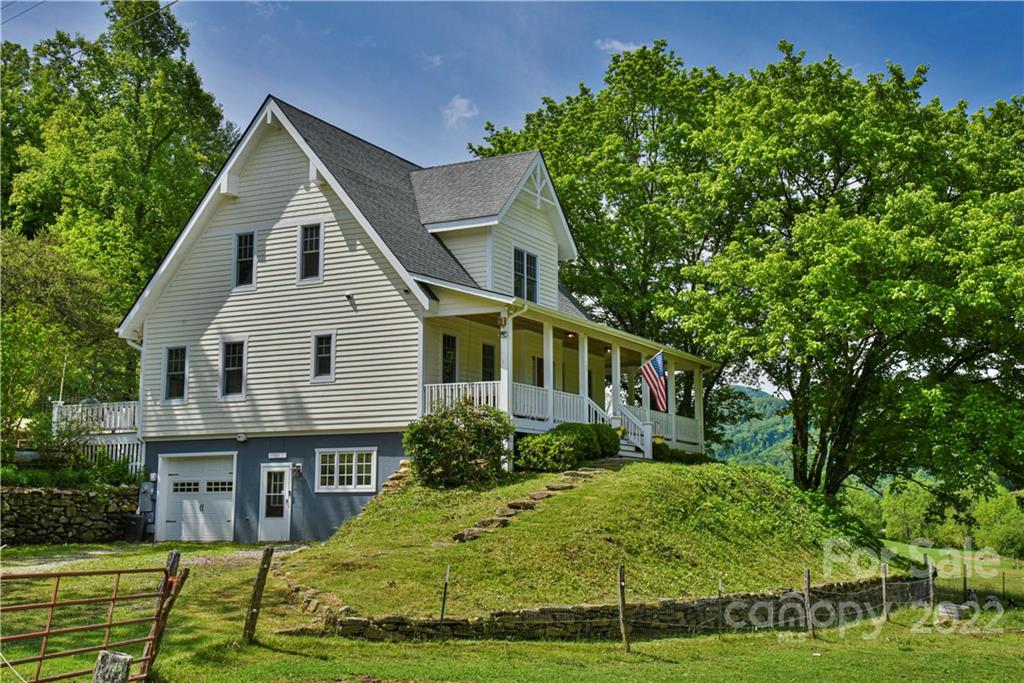 157 Poverty Branch Road Barnardsville, NC 28709 - Photo 2 of 48 a front view of a house with a yard