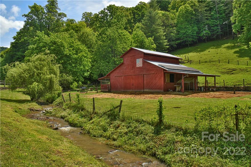 157 Poverty Branch Road Barnardsville, NC 28709 - Photo 40 of 48 a house view with a garden space