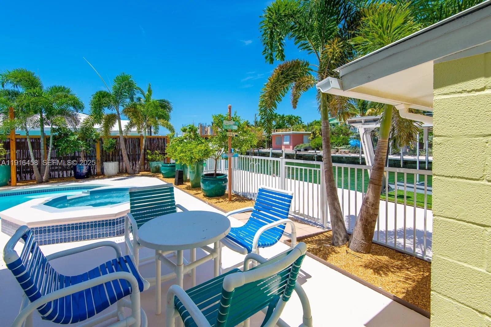 11563 4th Ave Ocean Marathon, FL 33050 - Photo 10 of 15 a view of a patio with iron fence