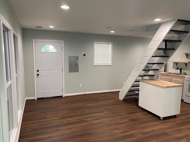 5919 River Road Flowery Branch, GA 30542 - Photo 15 of 18 wooden floor in an empty room with wooden floor and stairs