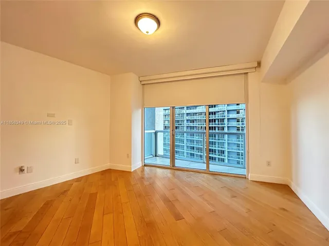 an empty room with a fireplace