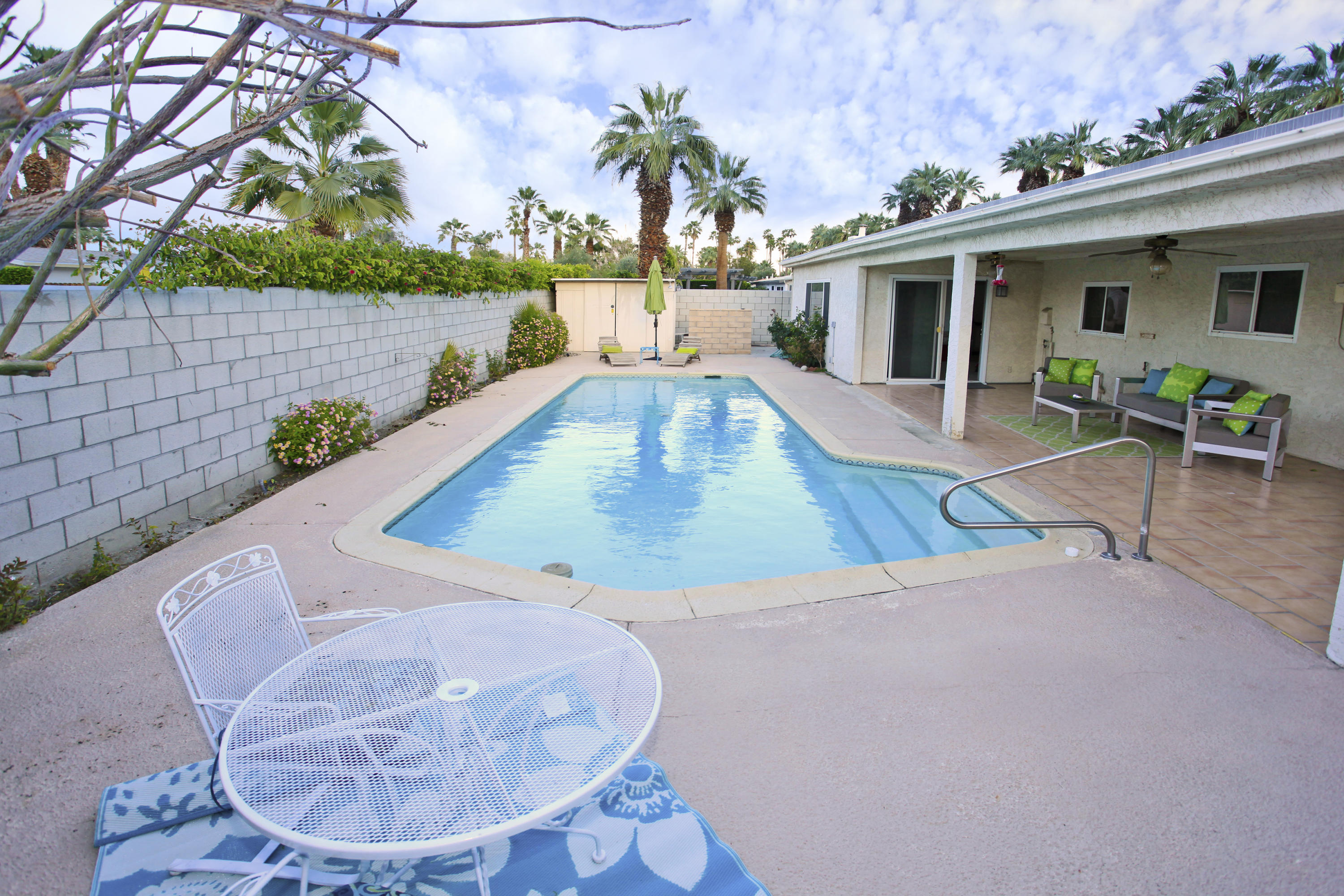 70090 Chappel Road Rancho Mirage, CA 92270 - Photo 1 of 26 a view of a swimming pool with a patio