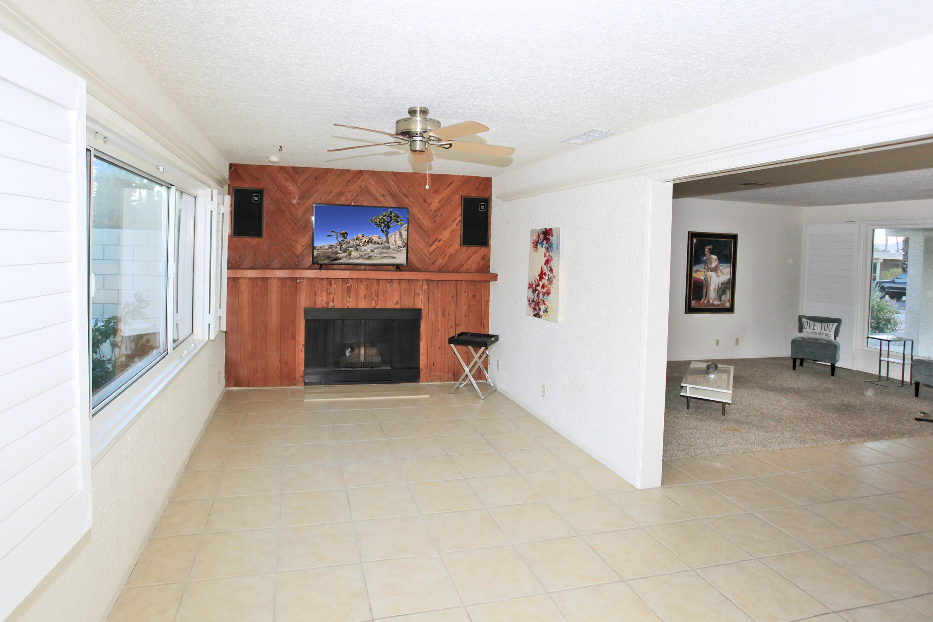 70090 Chappel Road Rancho Mirage, CA 92270 - Photo 16 of 26 an empty room with furniture and a fireplace