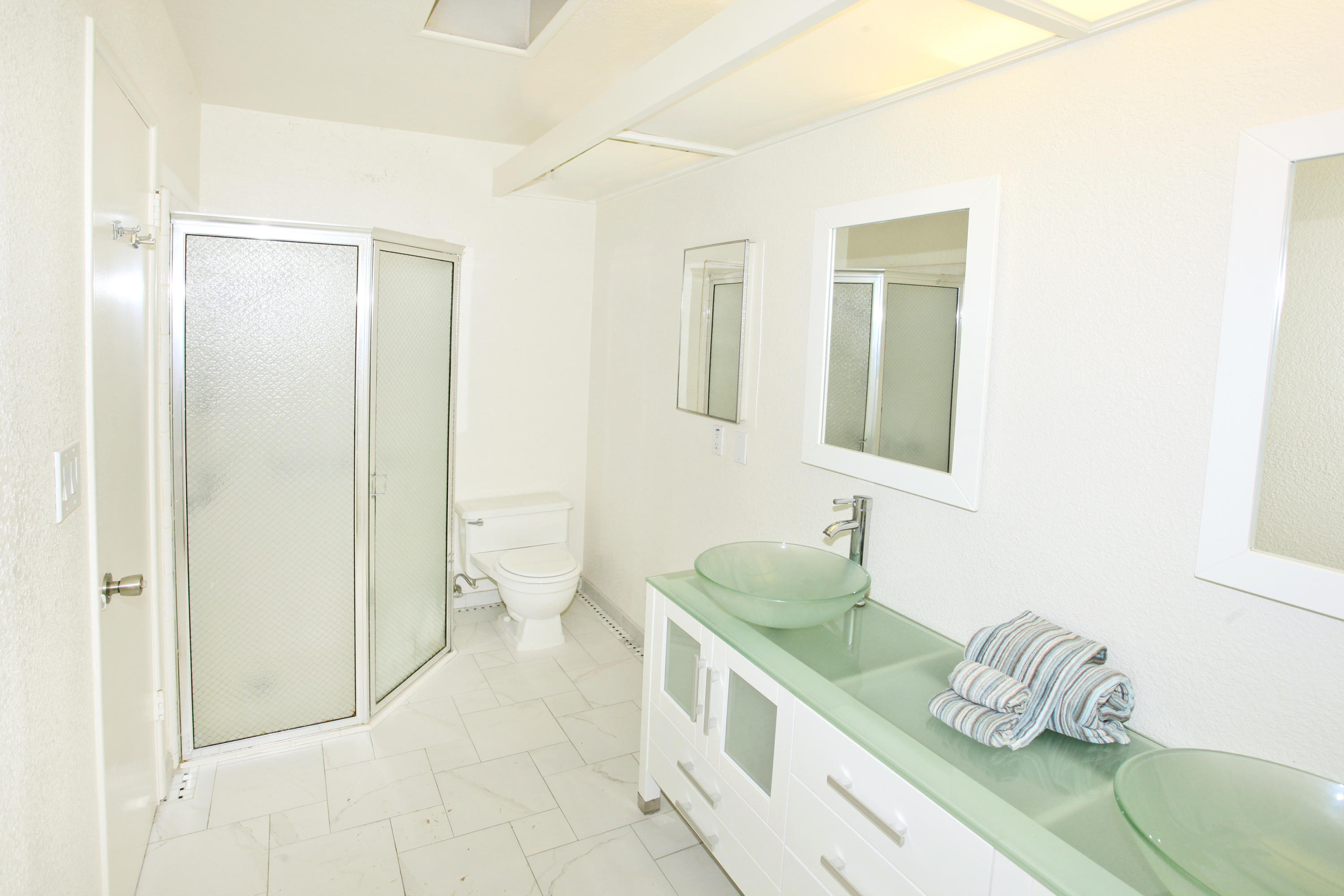 70090 Chappel Road Rancho Mirage, CA 92270 - Photo 18 of 26 a bathroom with a granite countertop sink and a mirror
