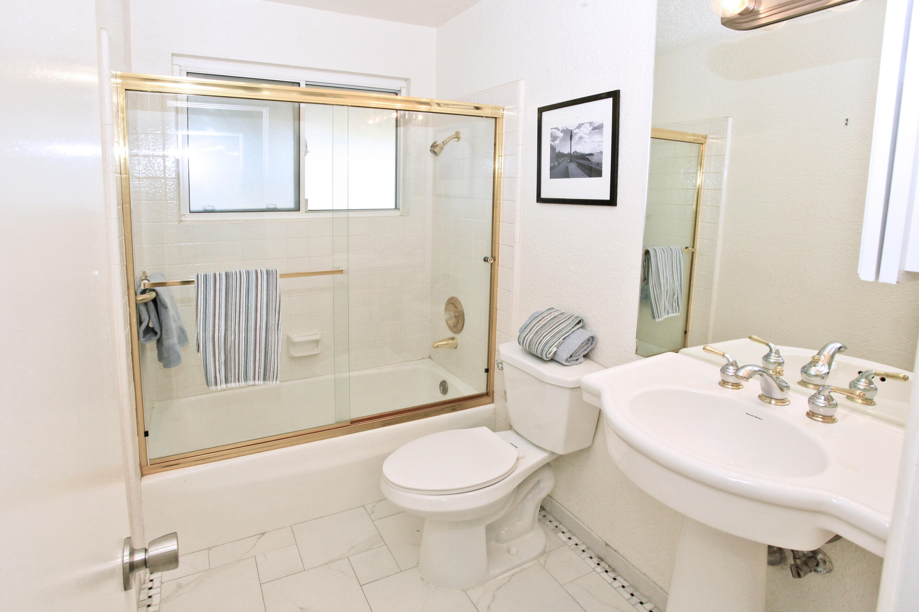 70090 Chappel Road Rancho Mirage, CA 92270 - Photo 21 of 26 a bathroom with a sink toilet and shower