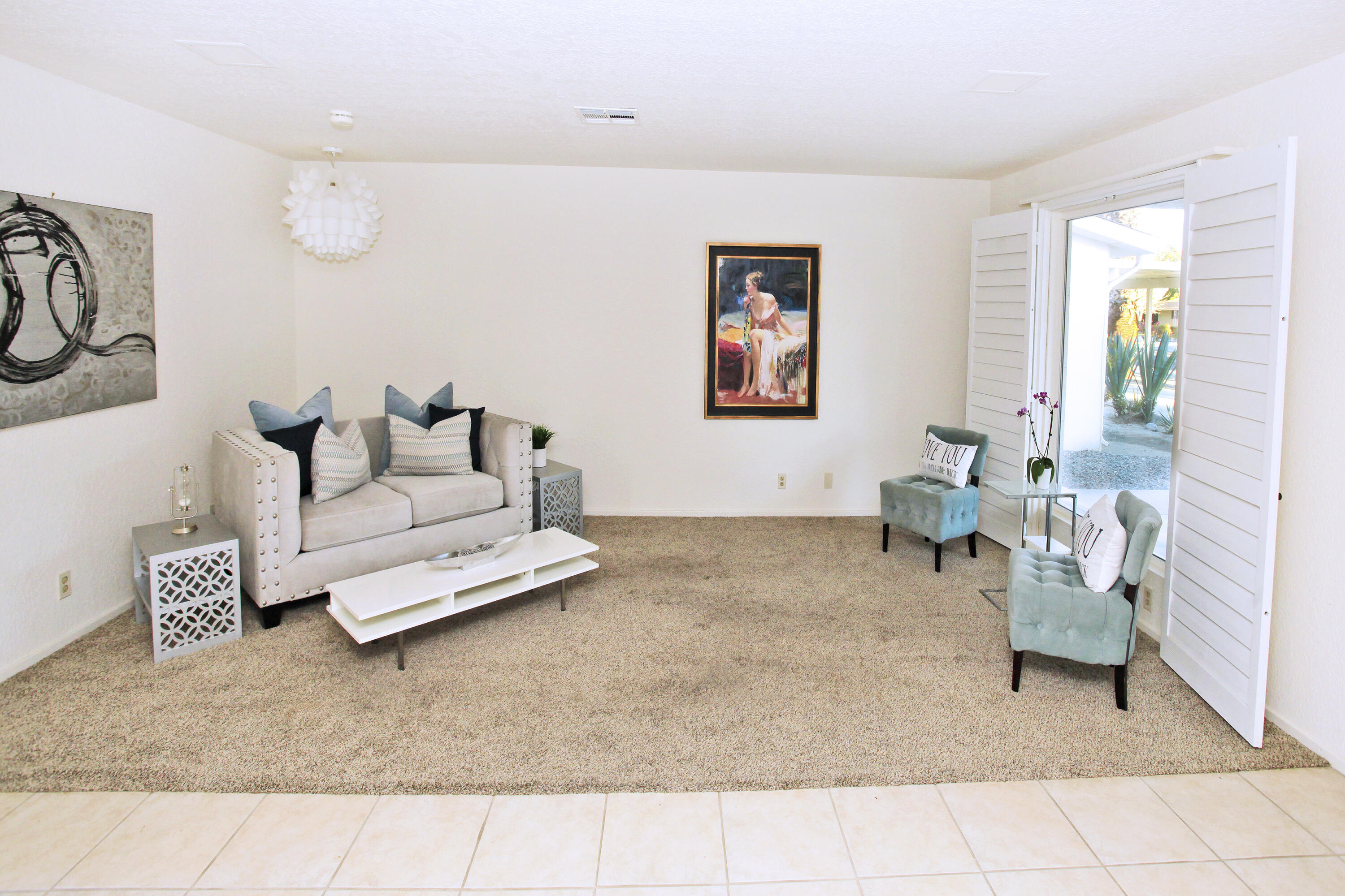 70090 Chappel Road Rancho Mirage, CA 92270 - Photo 4 of 26 a living room with furniture and a couch