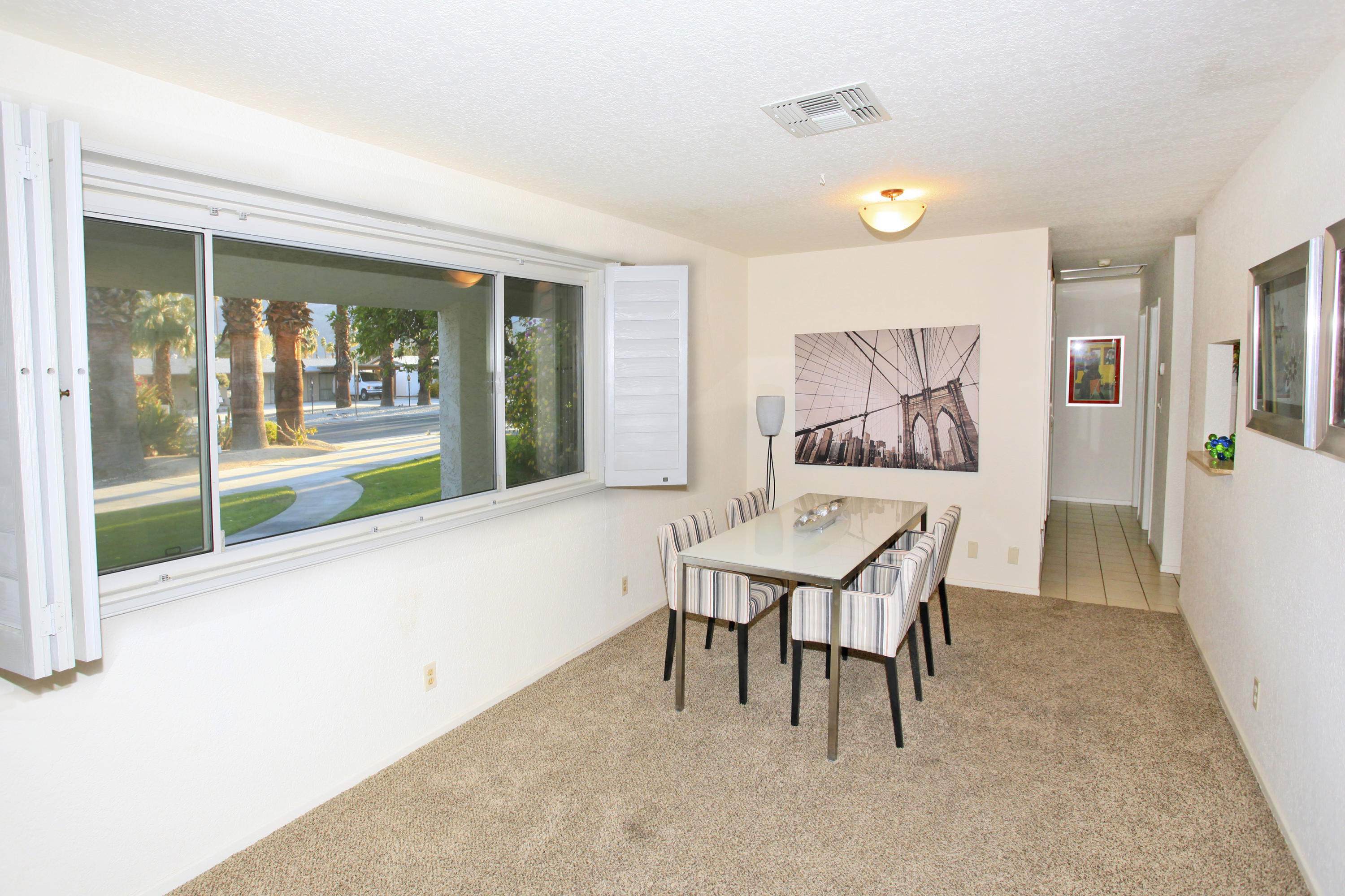 70090 Chappel Road Rancho Mirage, CA 92270 - Photo 5 of 26 a dining room with furniture and window