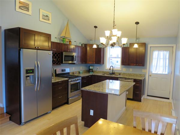 3096 Boston Road Wilbraham, MA 01095 - Photo 14 of 18 a kitchen with stainless steel appliances granite countertop a refrigerator a stove and a sink