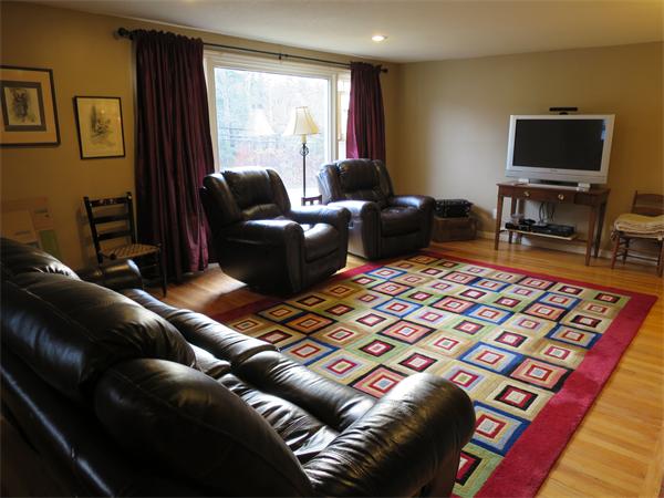 3096 Boston Road Wilbraham, MA 01095 - Photo 4 of 18 a living room with furniture and a flat screen tv