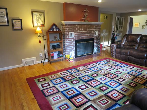 3096 Boston Road Wilbraham, MA 01095 - Photo 5 of 18 a living room with furniture and a fireplace