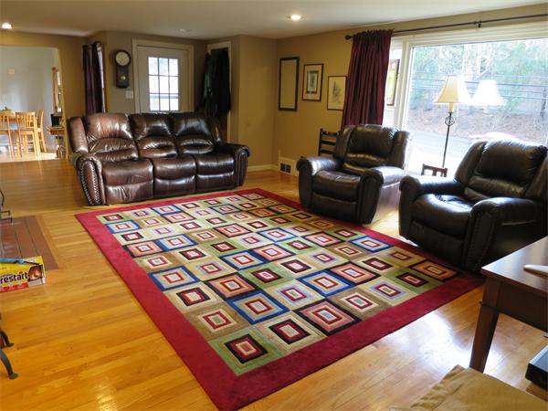 3096 Boston Road Wilbraham, MA 01095 - Photo 8 of 18 a living room with a couch and a table