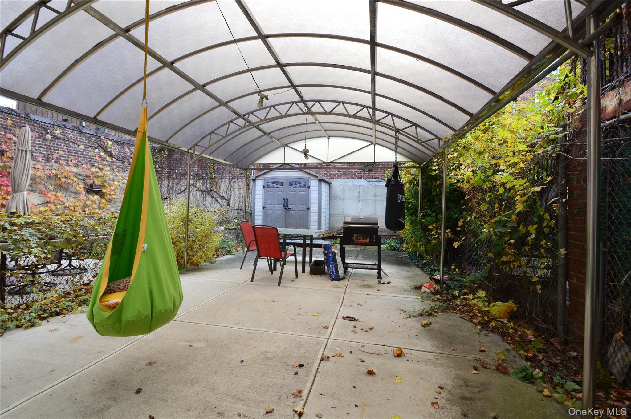 105-46 65th Road Queens, NY 11375 - Photo 6 of 20 a view of entryway with a table and chairs