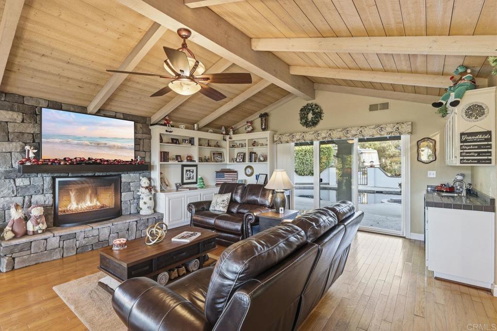 1524 Zutano Lane Fallbrook, CA 92028 - Photo 20 of 49 a living room with furniture and a flat screen tv
