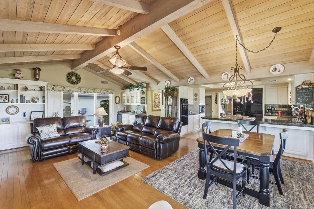 1524 Zutano Lane Fallbrook, CA 92028 - Photo 21 of 49 a living room with patio furniture and a wooden floor