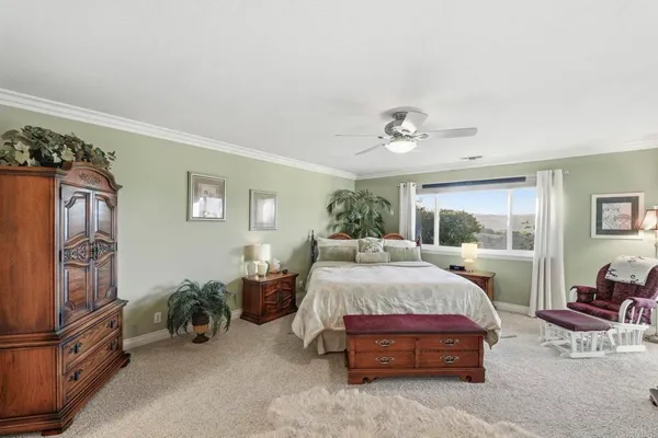 a bed room with a bed and furniture