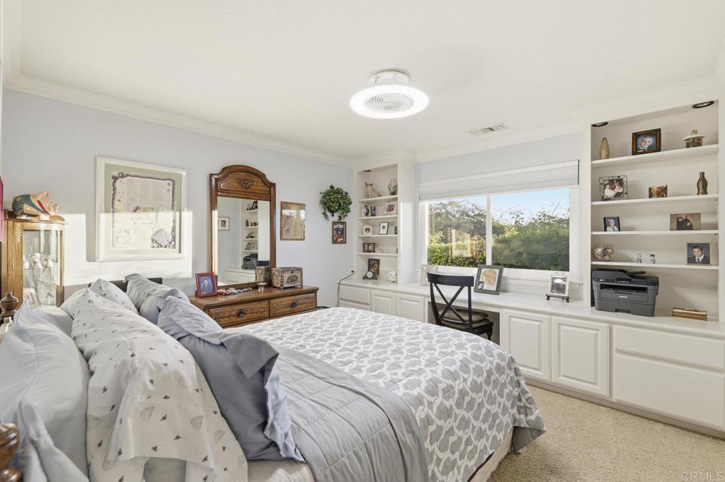 1524 Zutano Lane Fallbrook, CA 92028 - Photo 29 of 49 a bedroom with a bed and a large window with the outer view