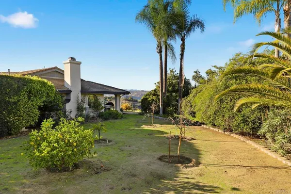 a house view with a garden space
