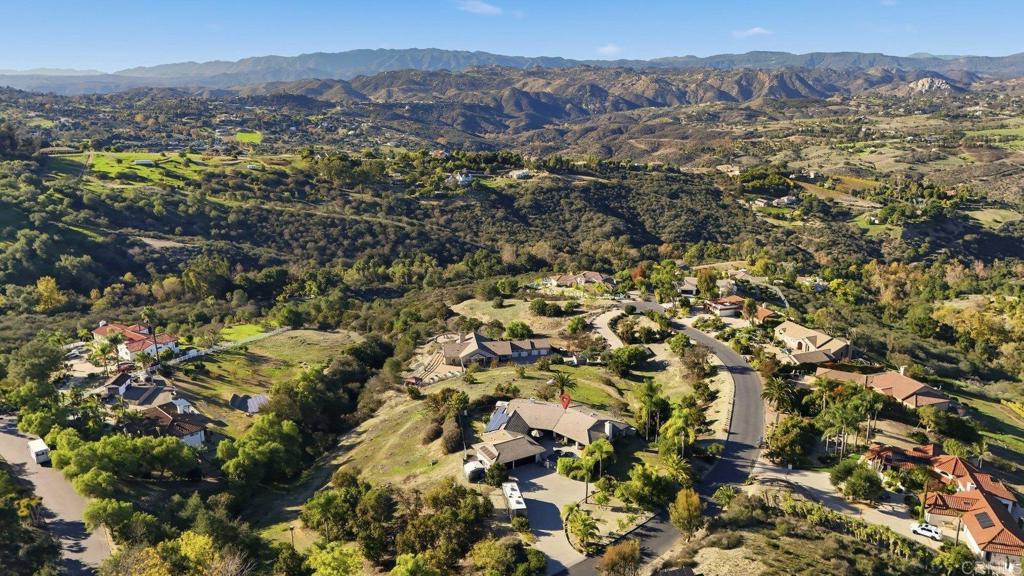 1524 Zutano Lane Fallbrook, CA 92028 - Photo 45 of 49 an aerial view of residential house with parking and mountain view