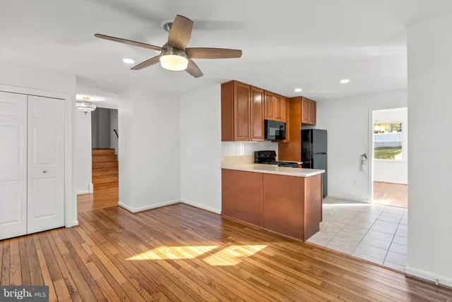 a view of kitchen and wooden floor
