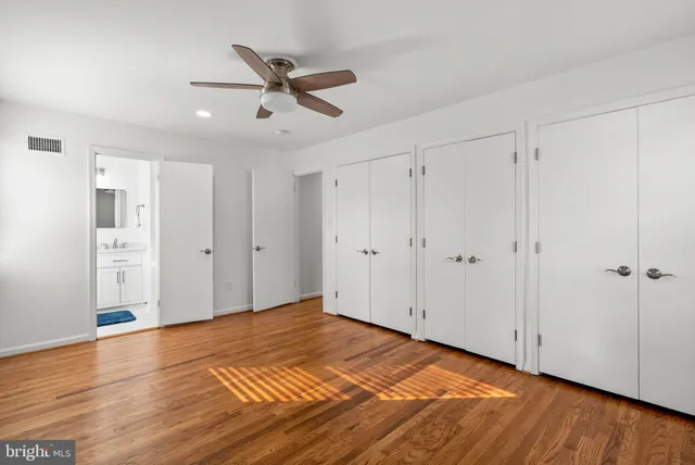 a view of a livingroom with wooden floor