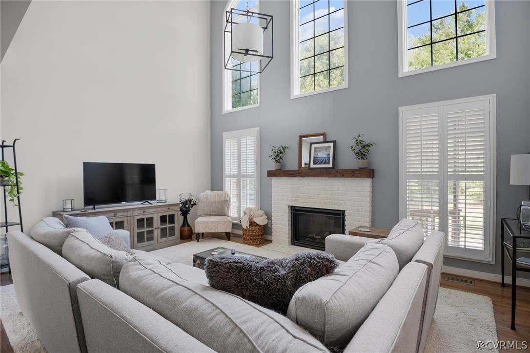 14012 Lenox Forest Court Midlothian, VA 23113 - Photo 13 of 49 a living room with furniture wooden floor and a flat screen tv