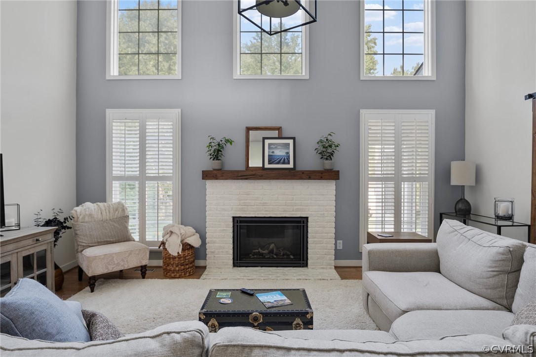 14012 Lenox Forest Court Midlothian, VA 23113 - Photo 14 of 49 a living room with furniture or couch and a fireplace