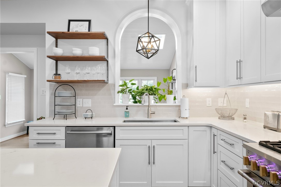 14012 Lenox Forest Court Midlothian, VA 23113 - Photo 20 of 49 a kitchen with stainless steel appliances white cabinets and a sink