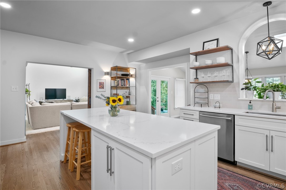 14012 Lenox Forest Court Midlothian, VA 23113 - Photo 21 of 49 a kitchen with a sink a stove and cabinets
