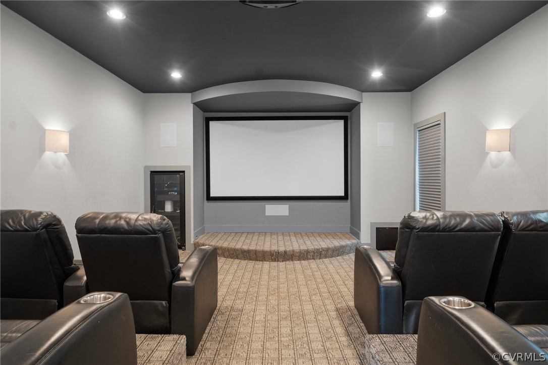 14012 Lenox Forest Court Midlothian, VA 23113 - Photo 28 of 49 a living room with furniture a projector and screen
