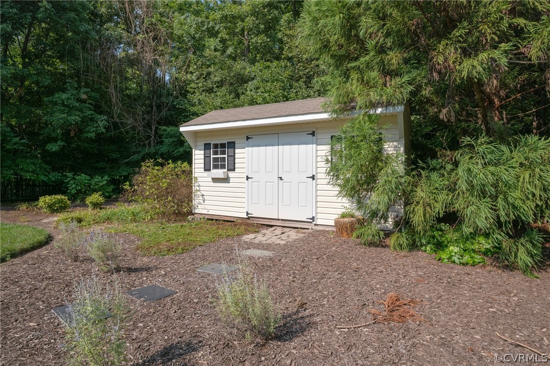 14012 Lenox Forest Court Midlothian, VA 23113 - Photo 47 of 49 a view of a house with a yard and garage