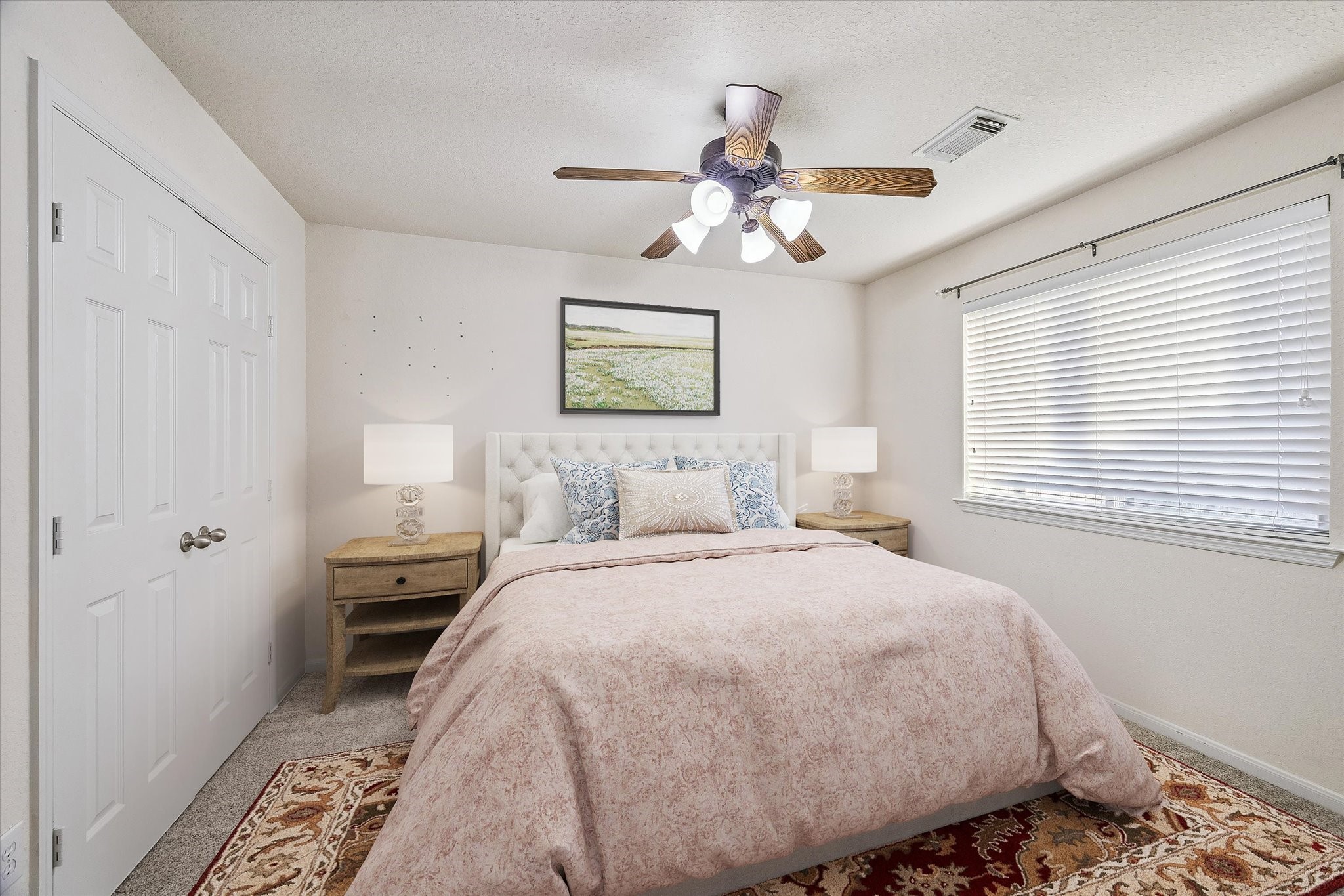 19403 Valiant Woods Drive Spring, TX 77379 - Photo 35 of 42 a bedroom with a bed and a window