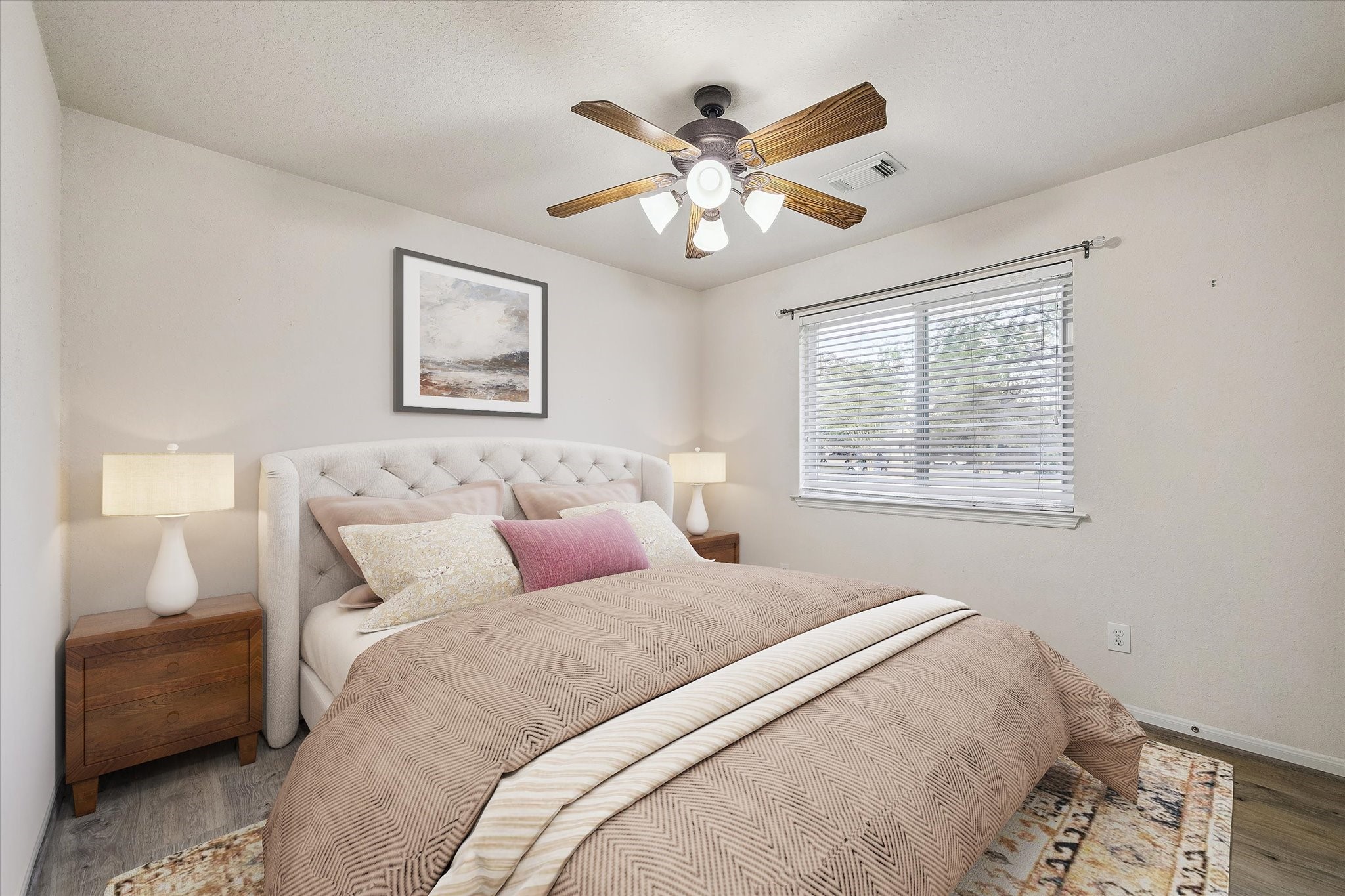 19403 Valiant Woods Drive Spring, TX 77379 - Photo 37 of 42 a bedroom with a large bed and a window