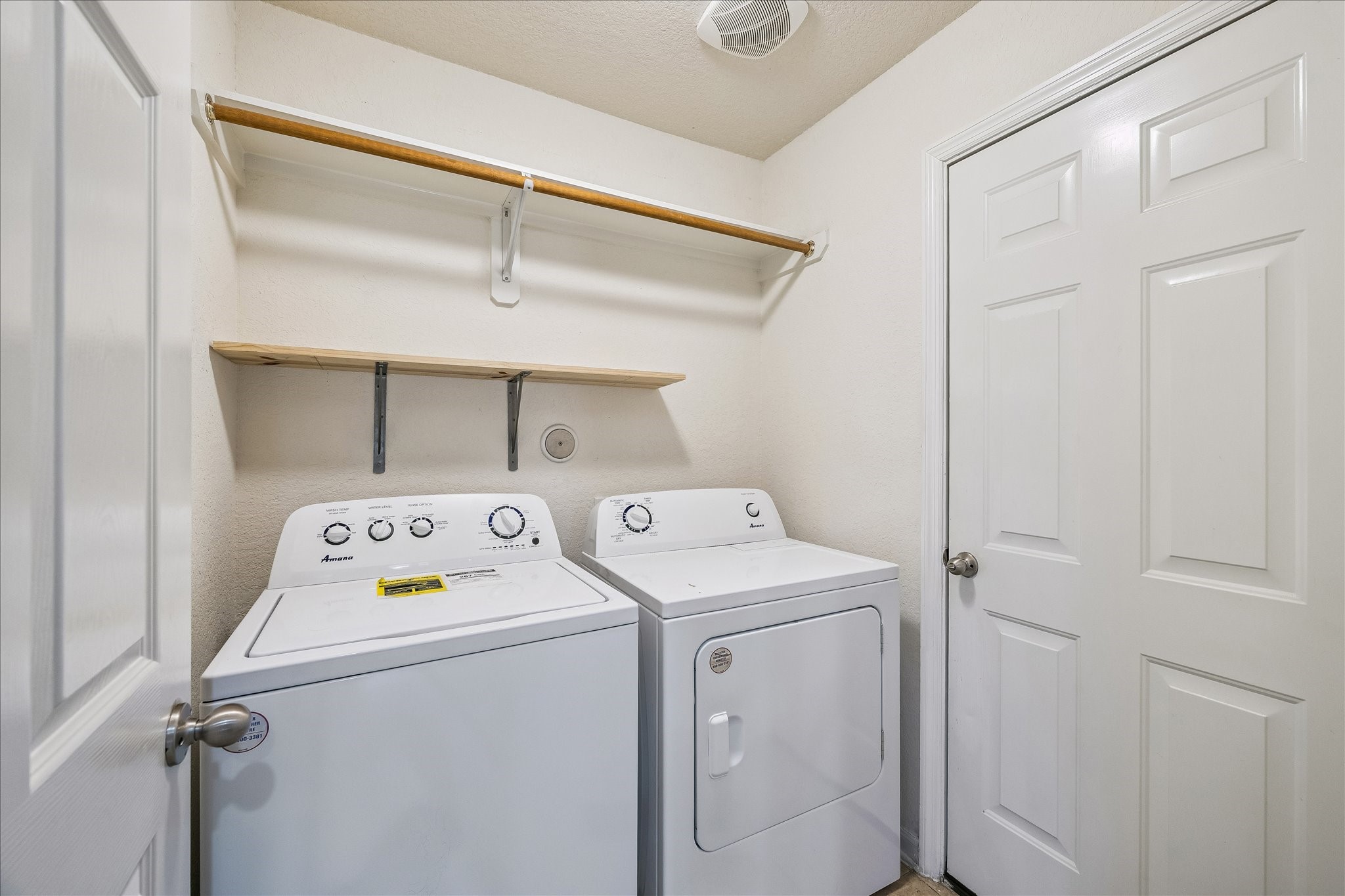 19403 Valiant Woods Drive Spring, TX 77379 - Photo 38 of 42 a utility room with dryer and washer