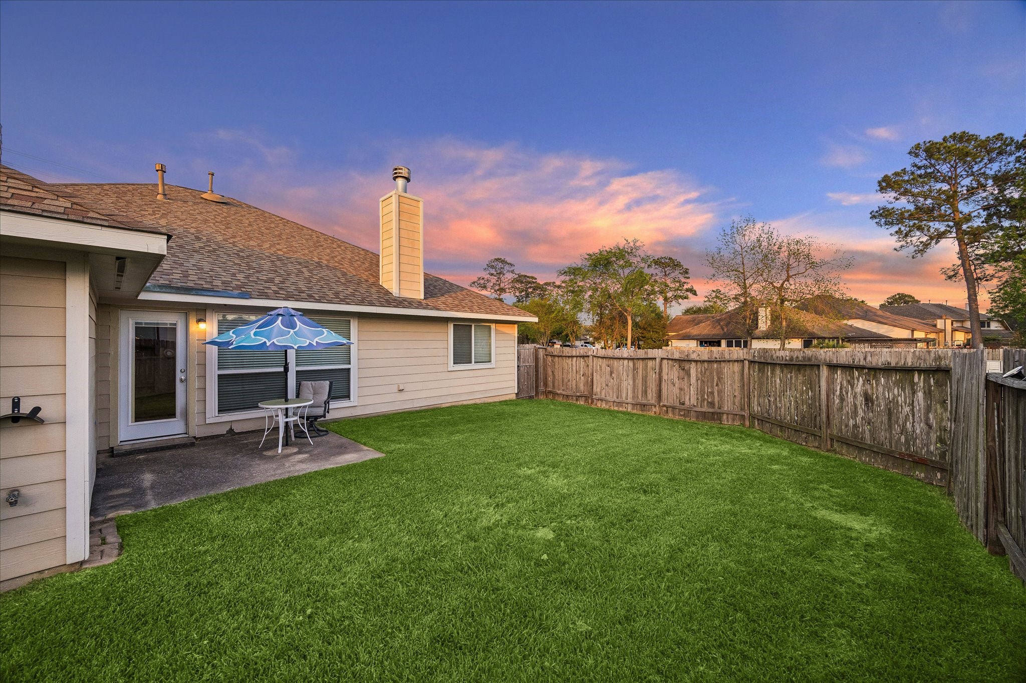 19403 Valiant Woods Drive Spring, TX 77379 - Photo 41 of 42 a view of a backyard with a sitting area