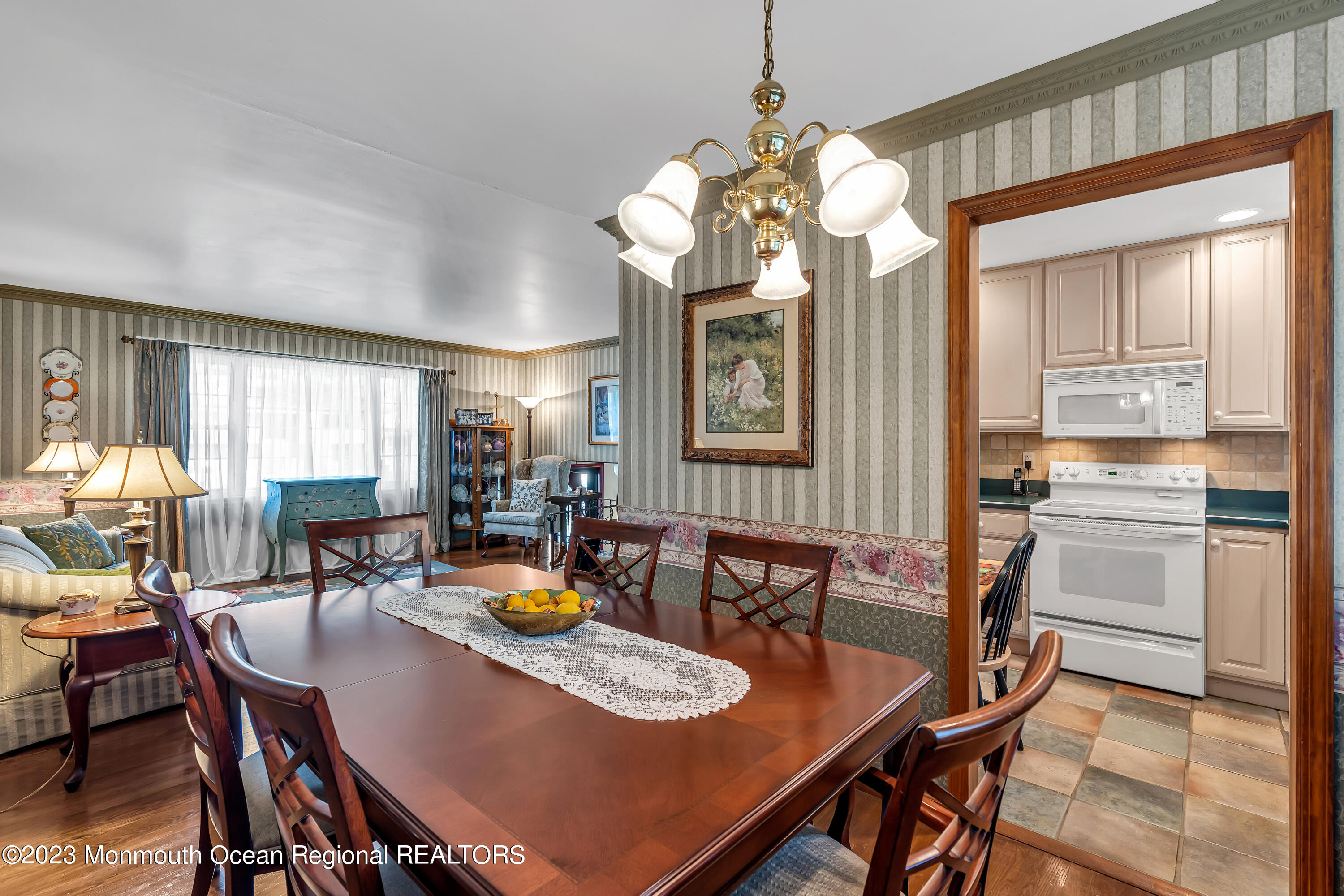 41 Citadel Drive Jackson, NJ 08527 - Photo 20 of 46 a view of a dining room with furniture and a chandelier