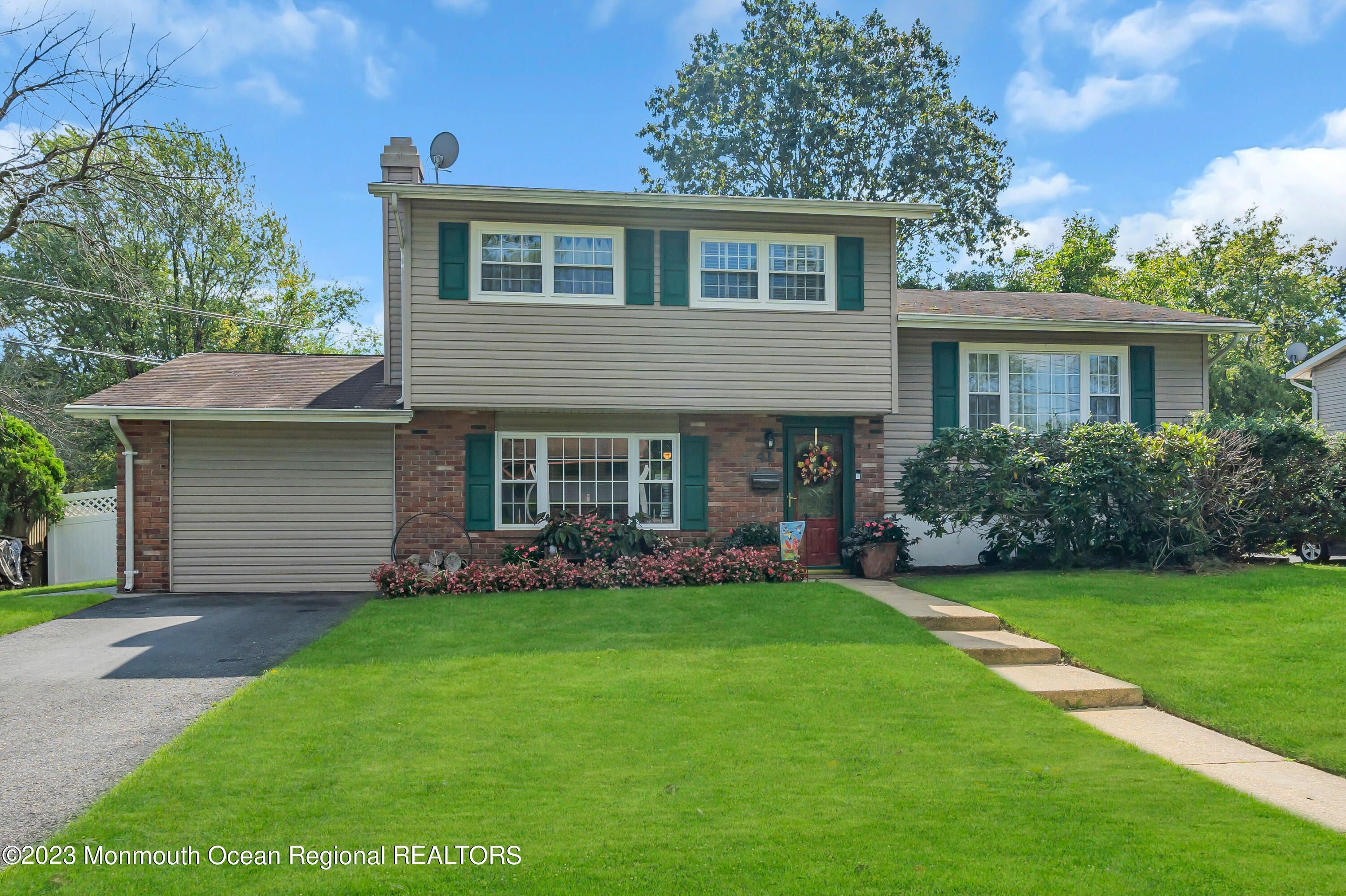 41 Citadel Drive Jackson, NJ 08527 - Photo 2 of 46 a front view of house with yard and green space