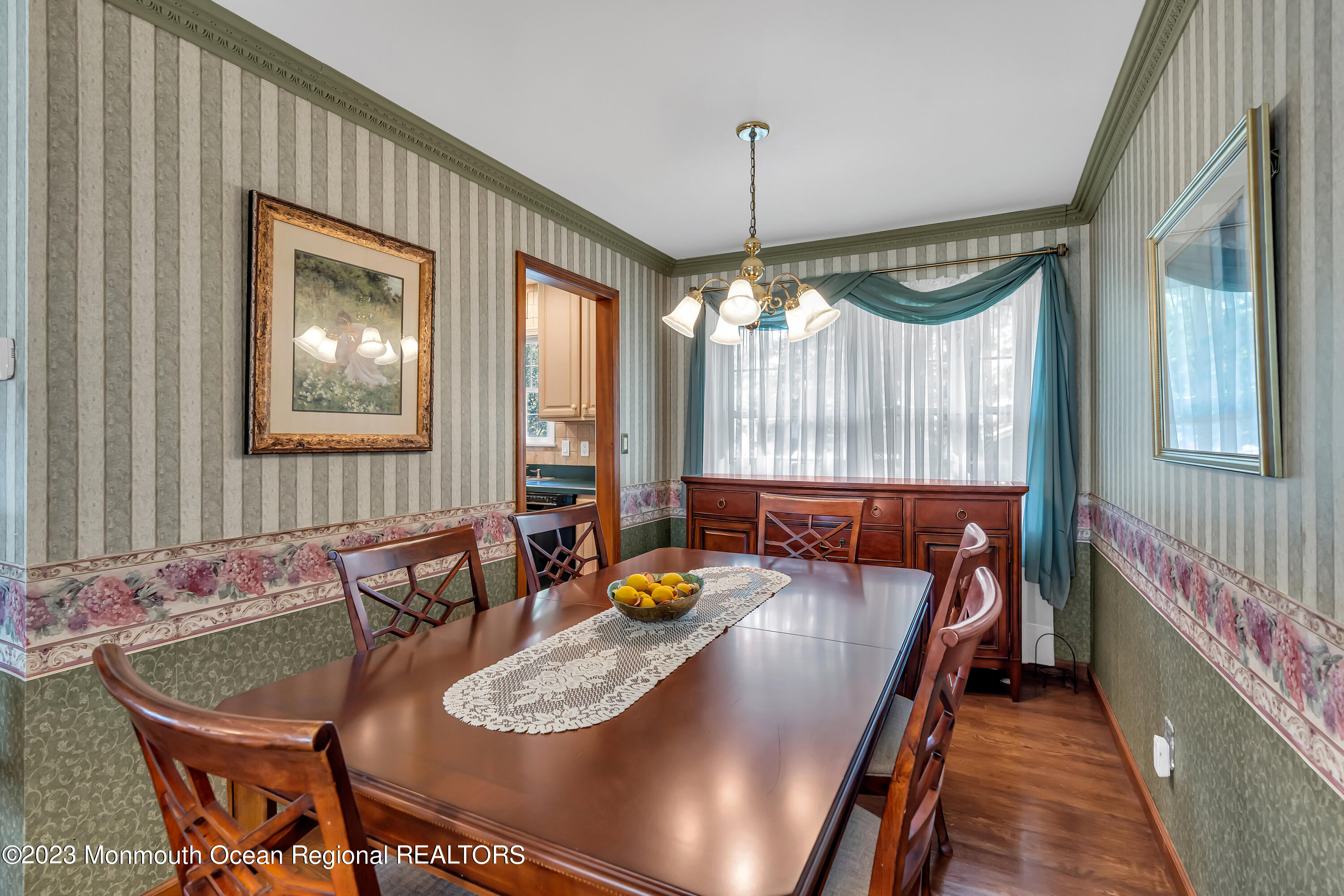 41 Citadel Drive Jackson, NJ 08527 - Photo 21 of 46 a dining room with chandelier