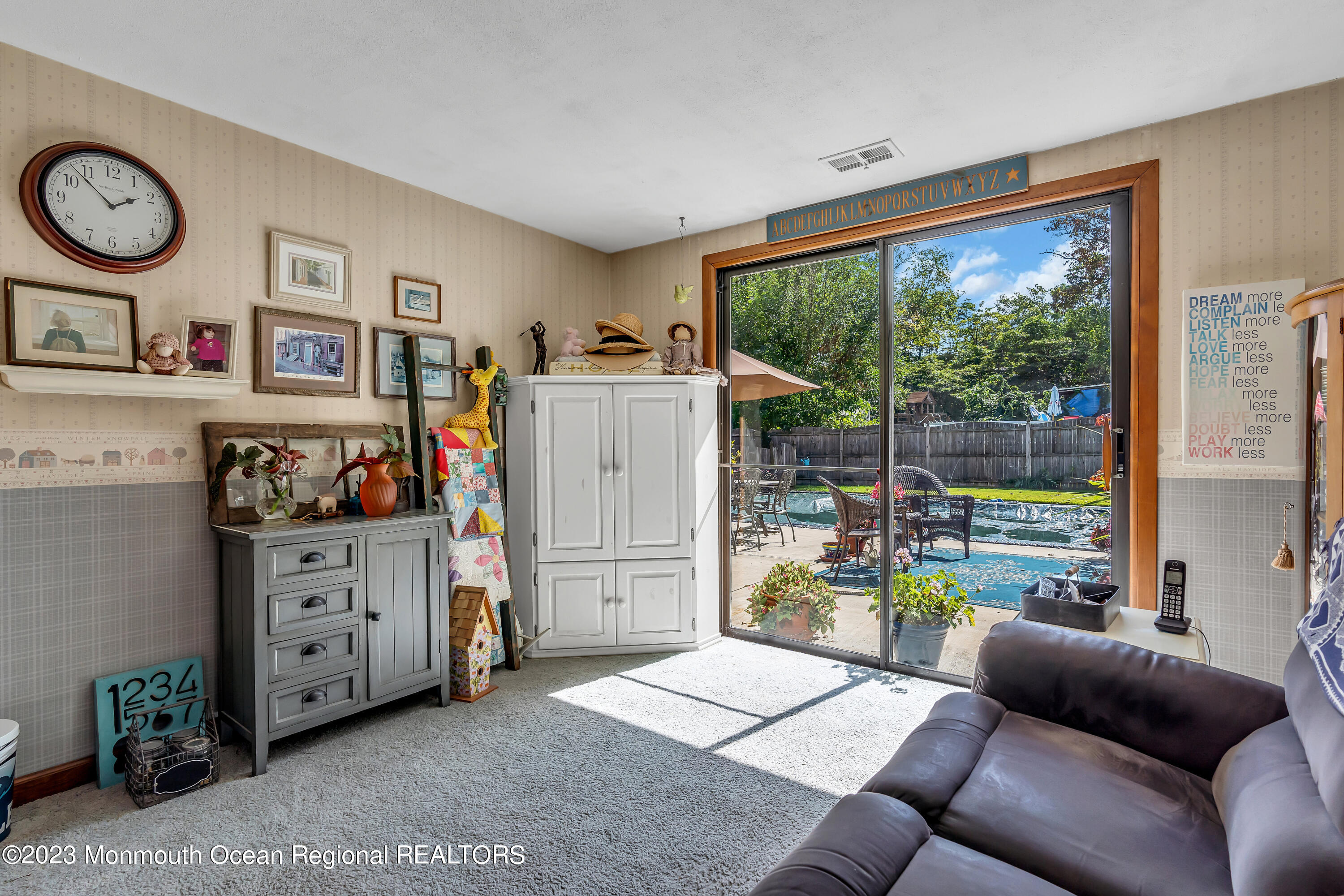 41 Citadel Drive Jackson, NJ 08527 - Photo 27 of 46 a living room with furniture and a large window