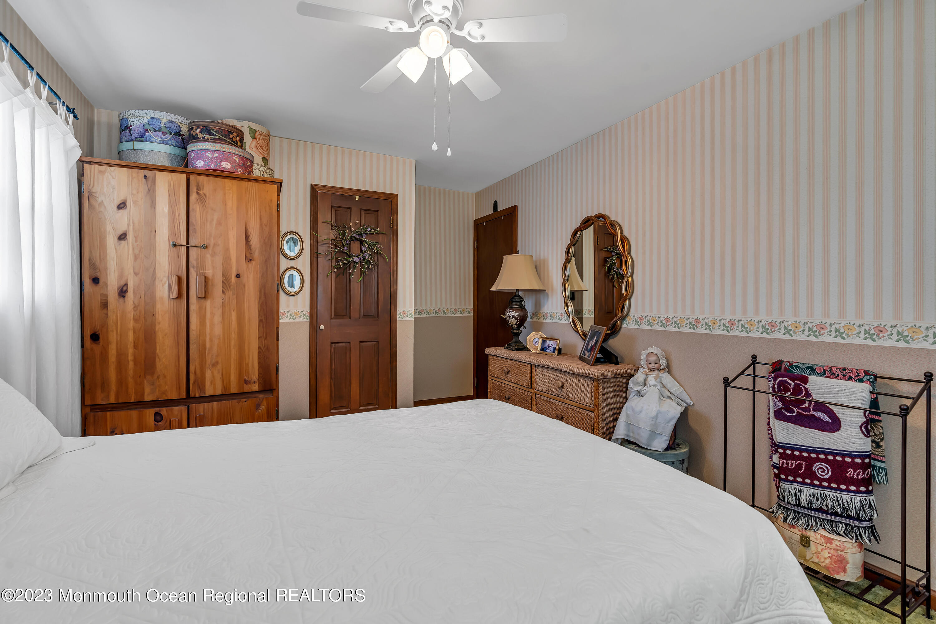 41 Citadel Drive Jackson, NJ 08527 - Photo 30 of 46 a bedroom with a large bed and a dresser
