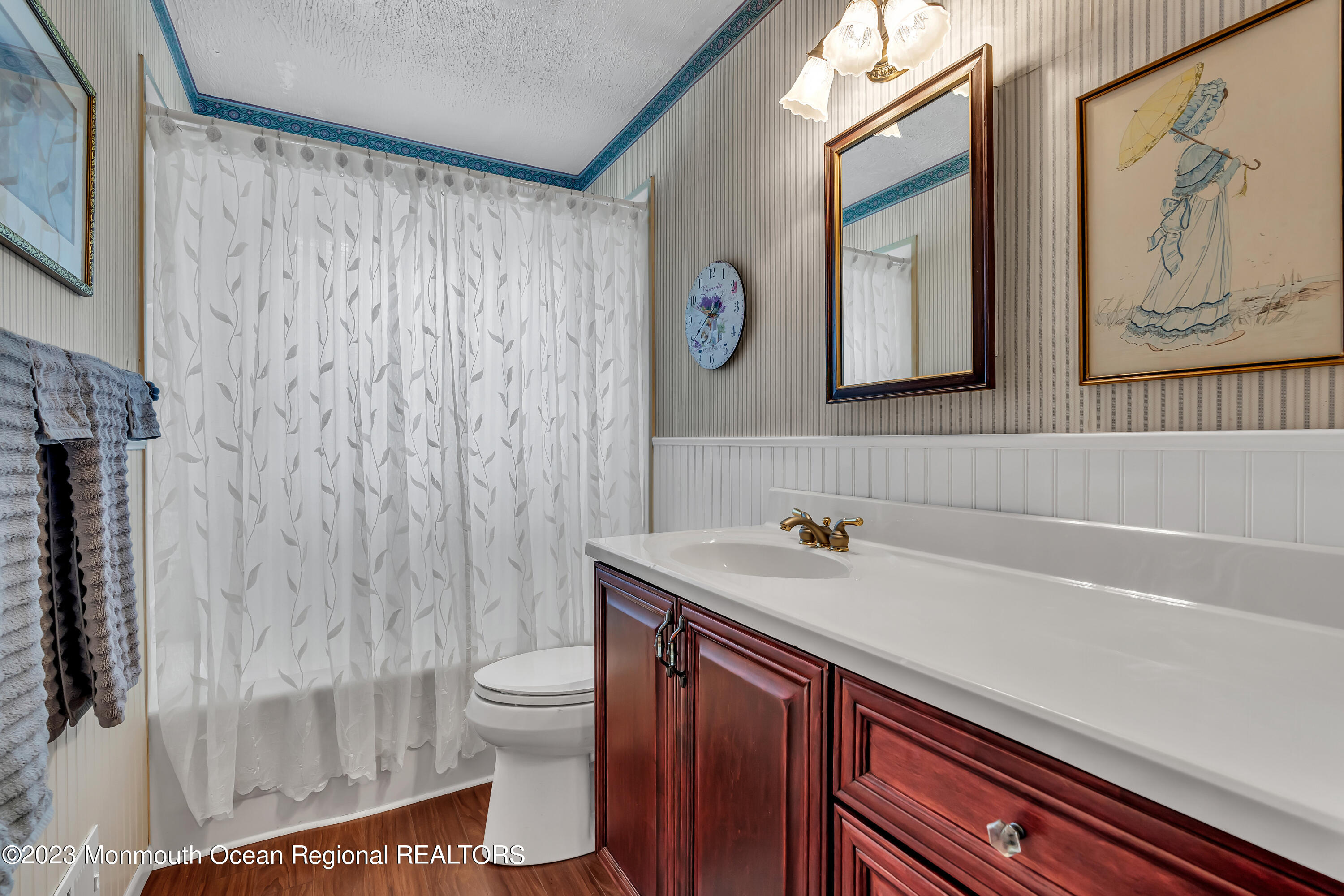 41 Citadel Drive Jackson, NJ 08527 - Photo 34 of 46 a bathroom with a sink a toilet and a shower curtain