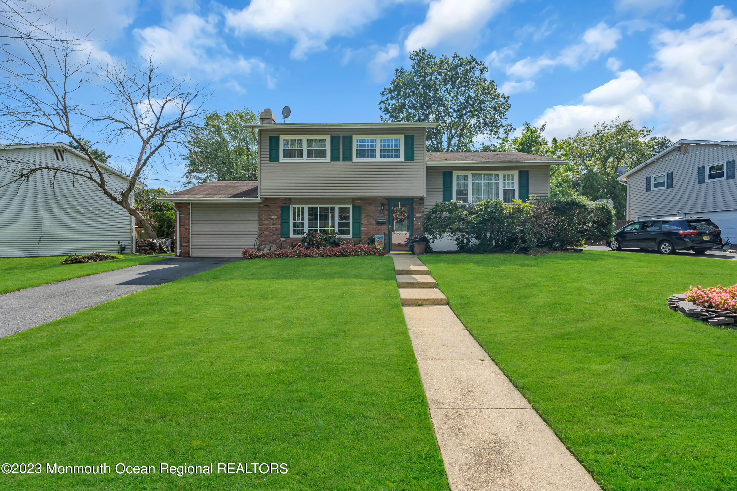 41 Citadel Drive Jackson, NJ 08527 - Photo 5 of 46 a front view of a house with garden
