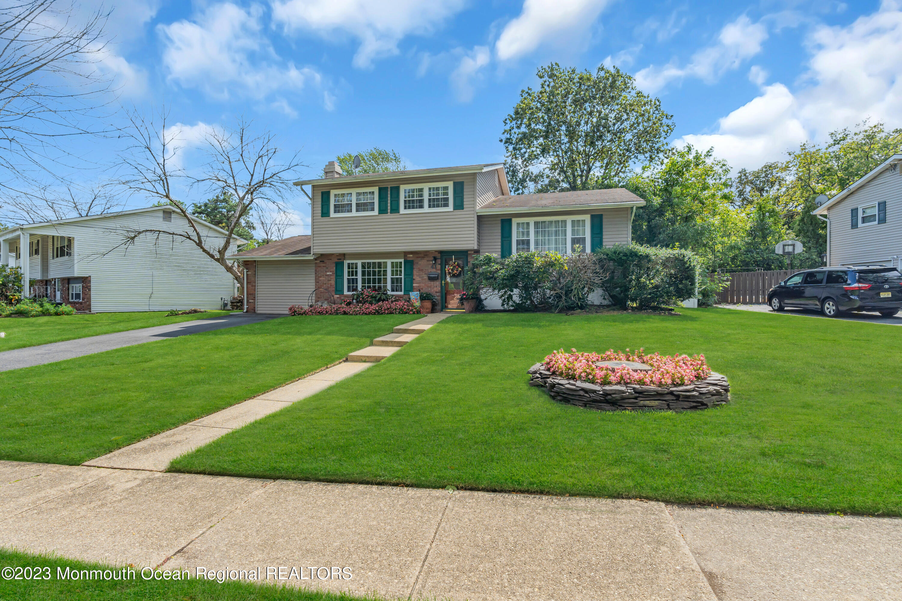 41 Citadel Drive Jackson, NJ 08527 - Photo 6 of 46 a front view of a house with a garden