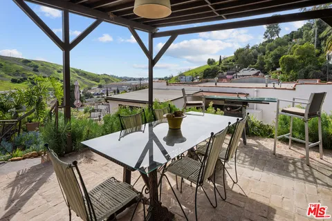 a view of an outdoor space with seating area