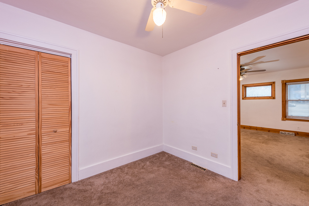 604 North Oplaine Road Waukegan, IL 60085 - Photo 17 of 31 an empty room with windows