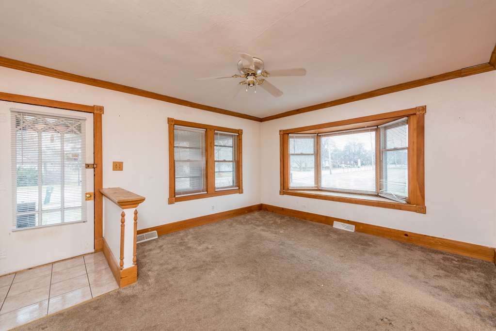 604 North Oplaine Road Waukegan, IL 60085 - Photo 2 of 31 a view of an empty room with a window