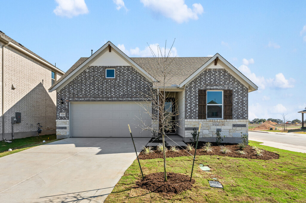 a front view of a house with entertaining space