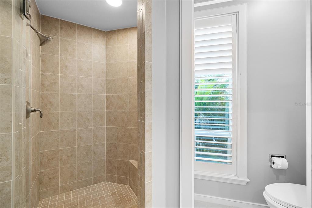 319 Pilot Point Lane Boca Grande, FL 33921 - Photo 28 of 62 a bathroom with a shower and a toilet