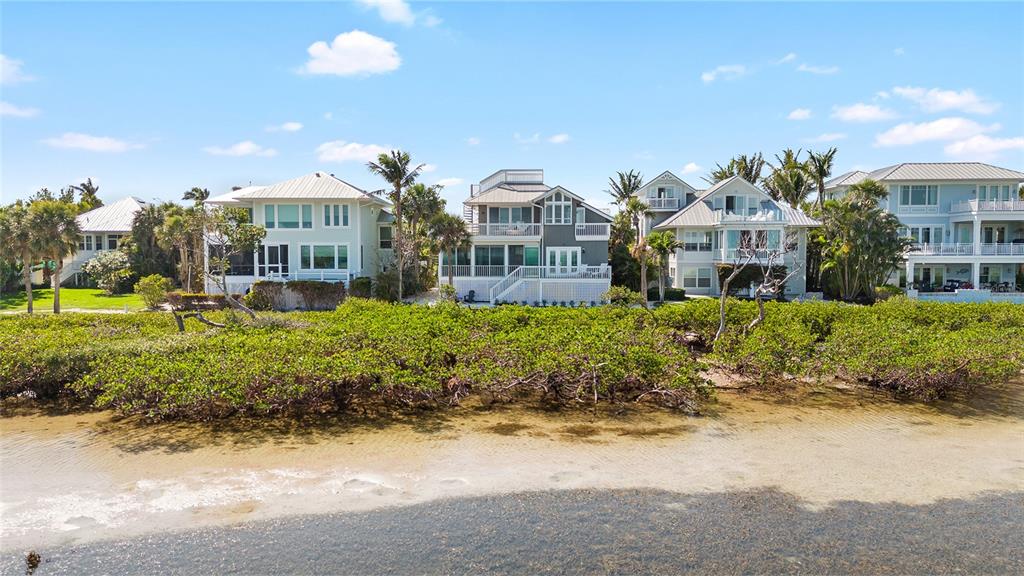 319 Pilot Point Lane Boca Grande, FL 33921 - Photo 53 of 62 a view of a house with a yard