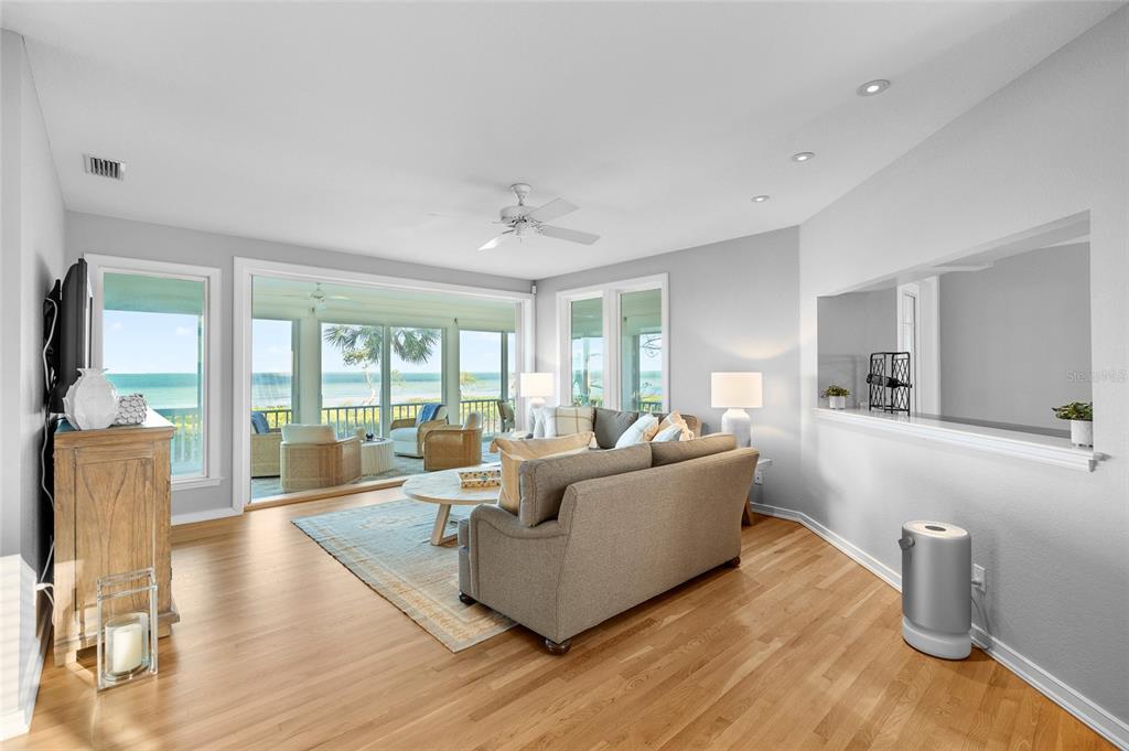 319 Pilot Point Lane Boca Grande, FL 33921 - Photo 6 of 62 a living room with furniture and a large window